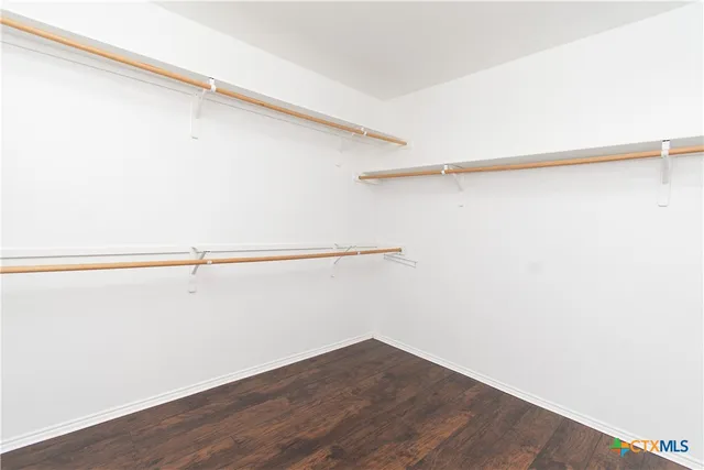 a view of a room with racks on the wall