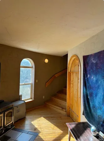 a view of livingroom with furniture and window