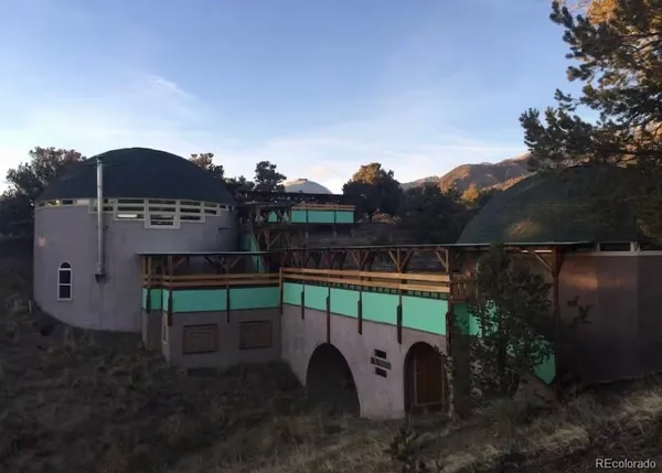 a view of a chairs setting on the roof deck