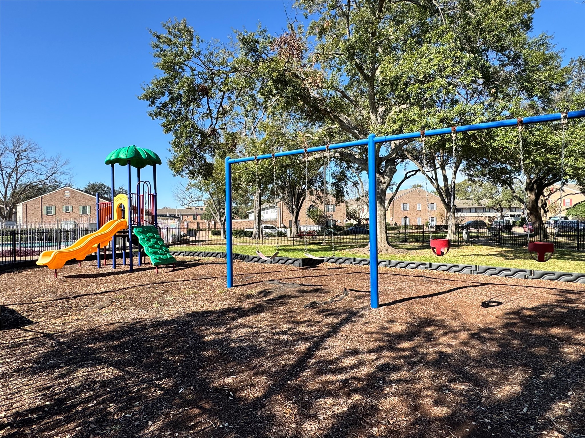 2041 Winrock Boulevard, Unit 157 Houston, TX 77057 - Photo 21 of 25 Playground equipment enclosed for protection, relaxation and fun. Read your favorite book while the kids are enjoying the sunshine, slide and swings!