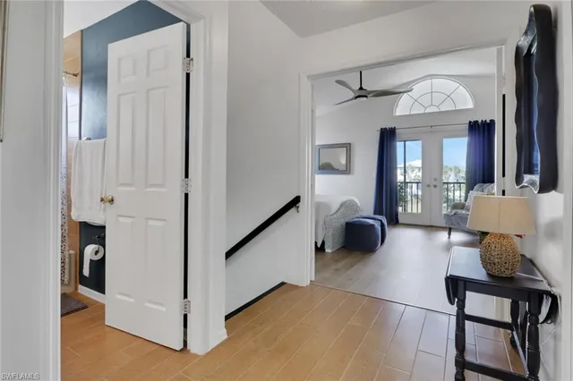 a view of a livingroom with furniture and a window