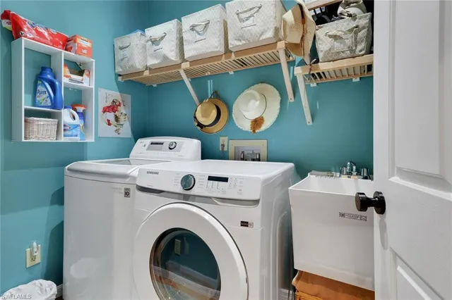 a utility room with dryer and washer