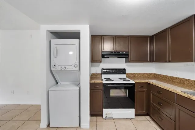 a kitchen with a stove and a sink