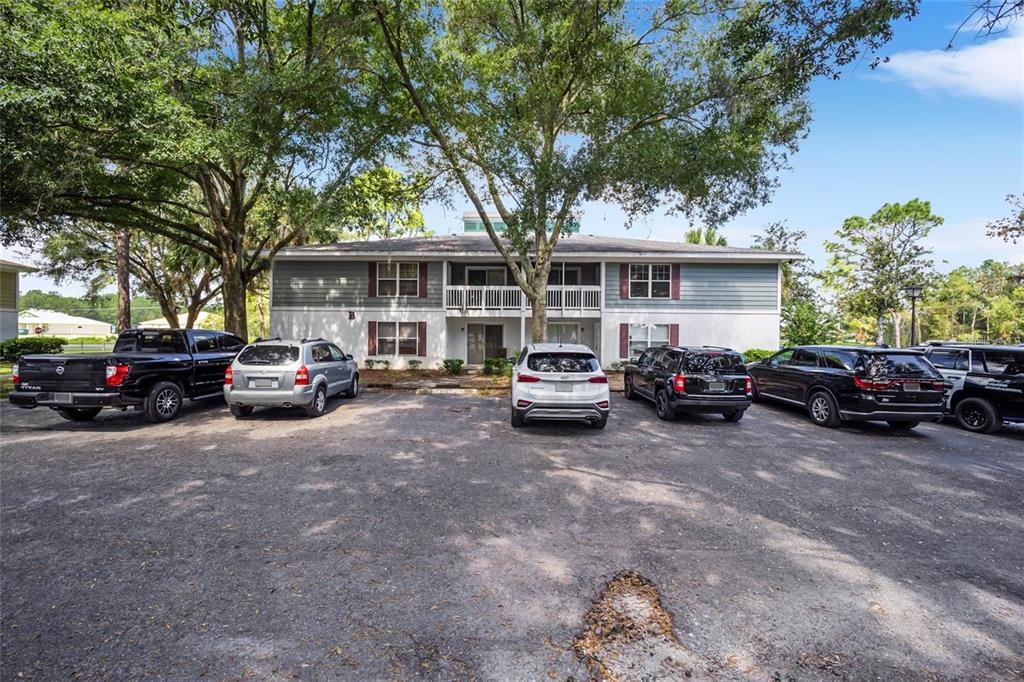 8202 Fairways Circle, Unit B202 Ocala, FL 34472 - Photo 22 of 27 a view of a car parked in front of house