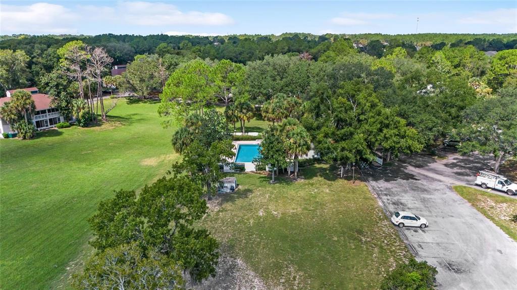 8202 Fairways Circle, Unit B202 Ocala, FL 34472 - Photo 24 of 27 a view of a garden with an outdoor seating