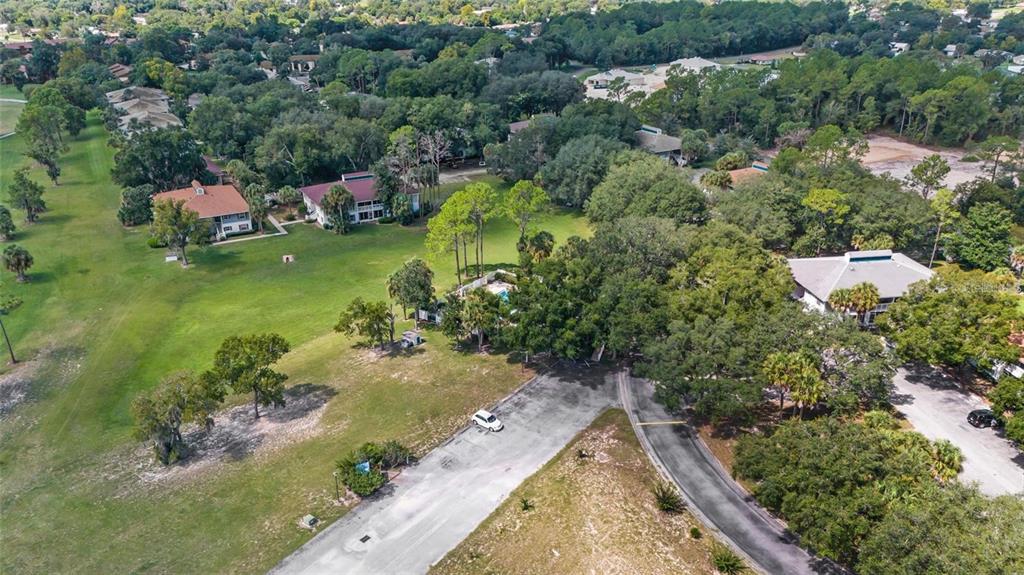 8202 Fairways Circle, Unit B202 Ocala, FL 34472 - Photo 25 of 27 an aerial view of a house with a yard