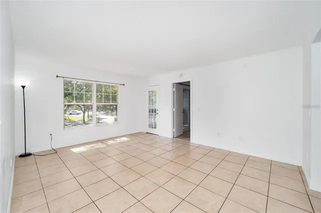 a view of an empty room and window