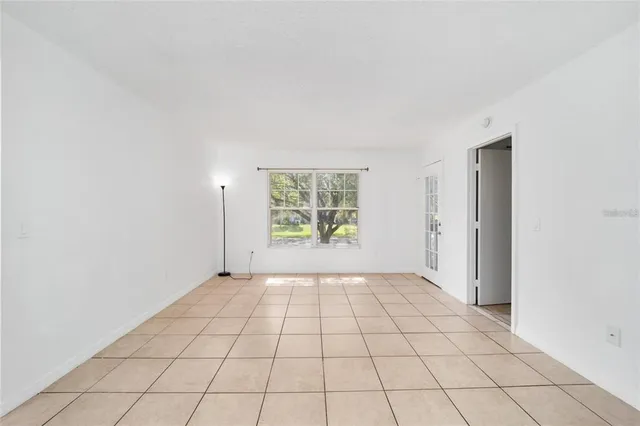 a view of an empty room and window