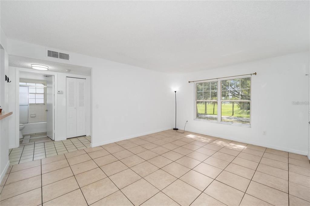 8202 Fairways Circle, Unit B202 Ocala, FL 34472 - Photo 7 of 27 a view of an empty room and window