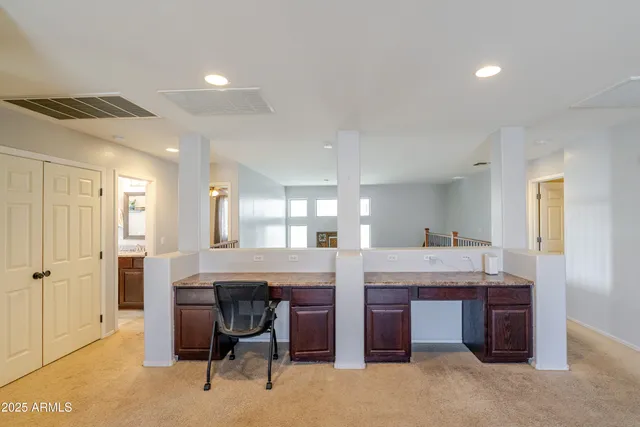 a view of a yard with a street from a porch