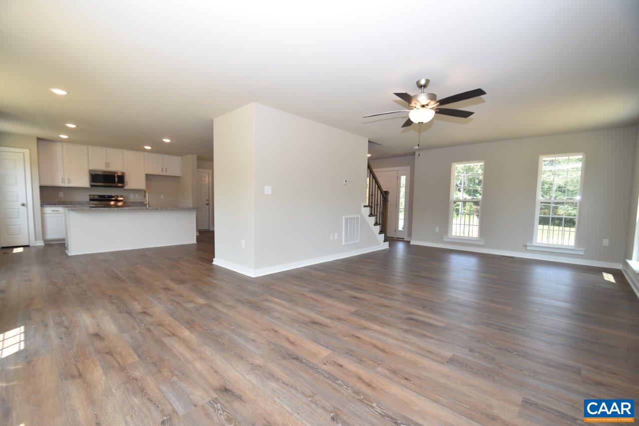 4696 Venable Road Kents Store, VA 23084 - Photo 14 of 28 a view of a kitchen and an empty room with a window