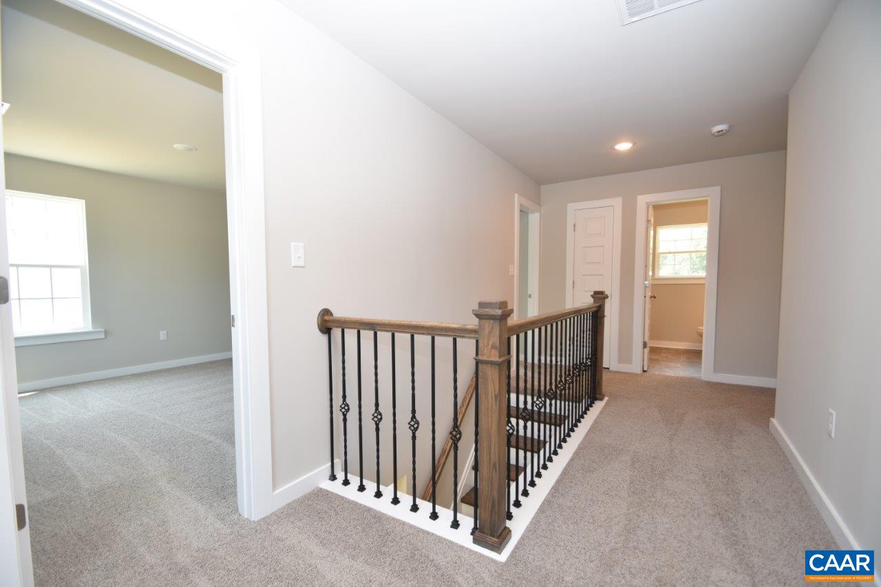 4696 Venable Road Kents Store, VA 23084 - Photo 17 of 28 a view of a hallway with windows