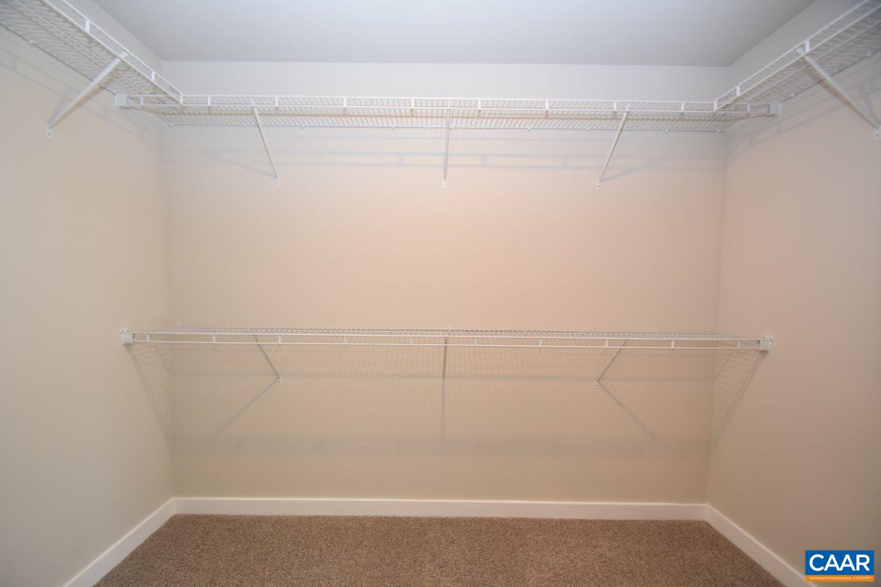4696 Venable Road Kents Store, VA 23084 - Photo 22 of 28 a view of a room with racks on the wall