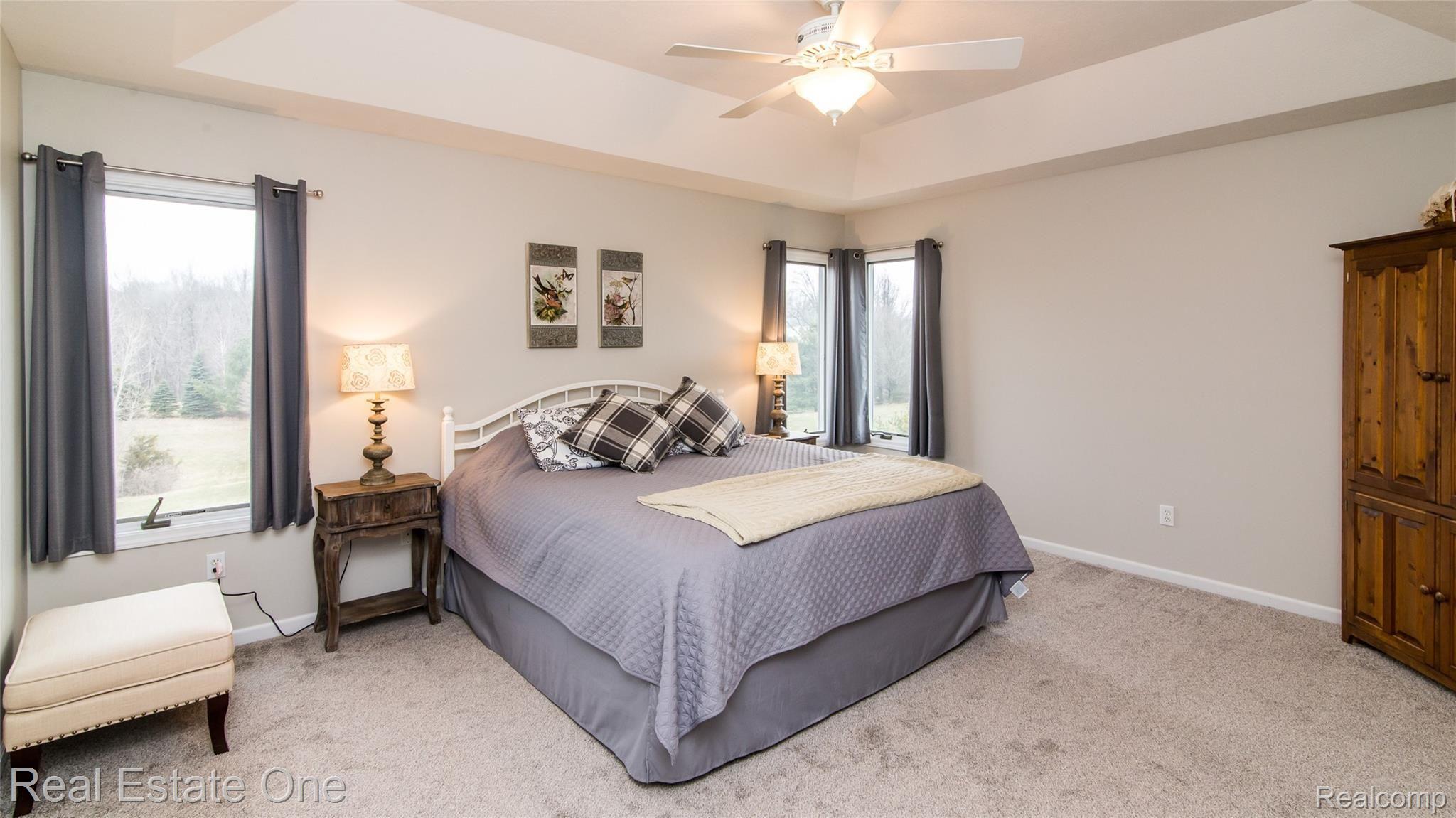 2610 Clivedon Road Howell, MI 48843 - Photo 27 of 43 master suite with tray ceiling