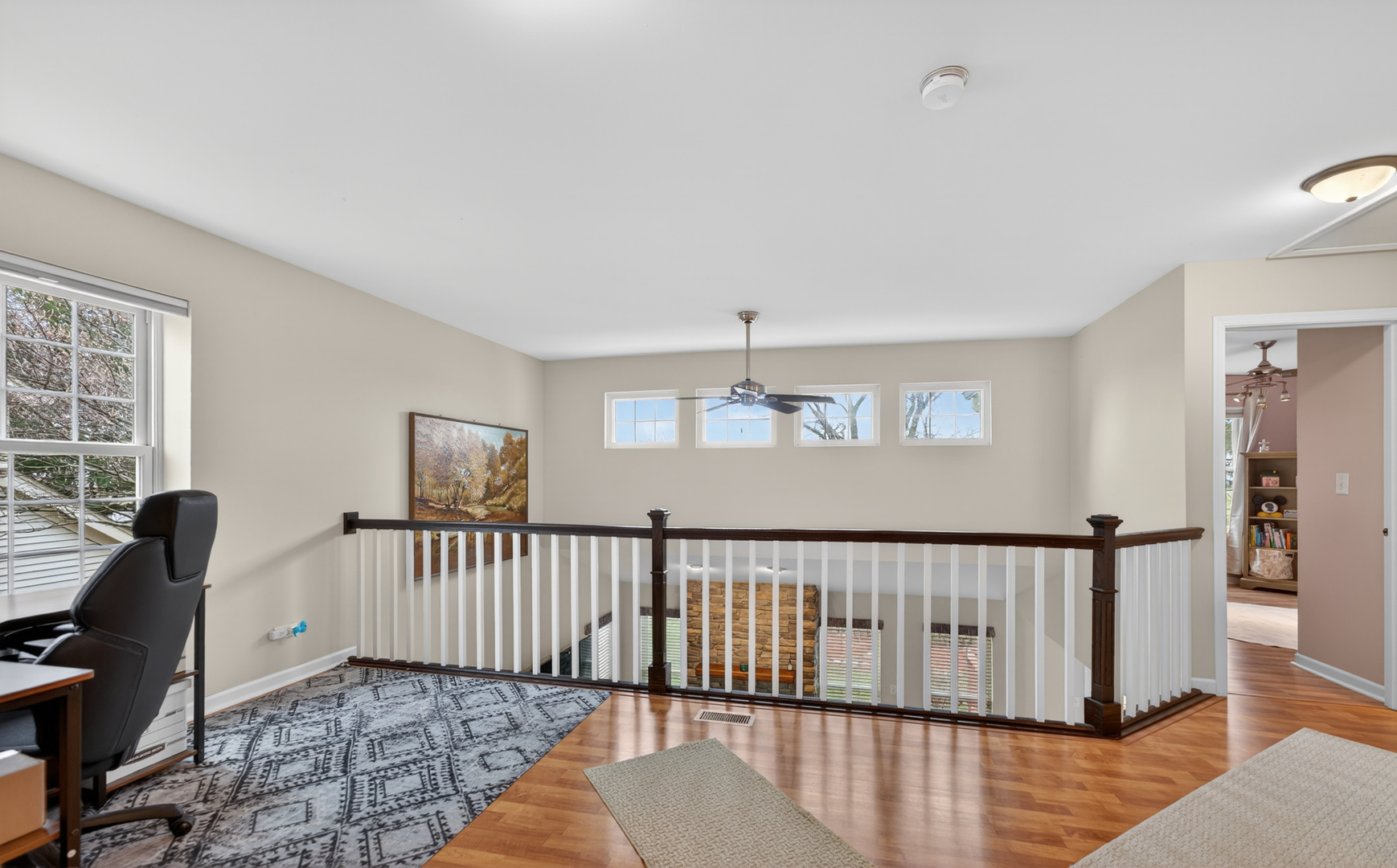 125 Ione Drive, Unit A South Elgin, IL 60177 - Photo 19 of 44 a view of a livingroom with a hardwood floor