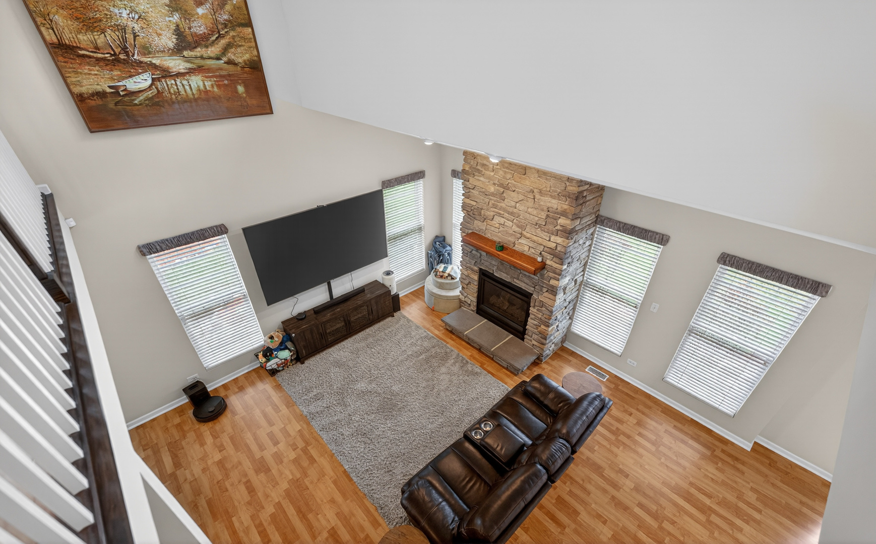 125 Ione Drive, Unit A South Elgin, IL 60177 - Photo 22 of 44 a living room with furniture and a flat screen tv