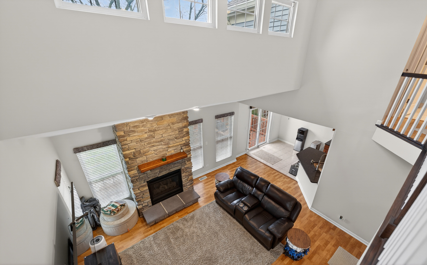 125 Ione Drive, Unit A South Elgin, IL 60177 - Photo 23 of 44 a living room with furniture and a fireplace