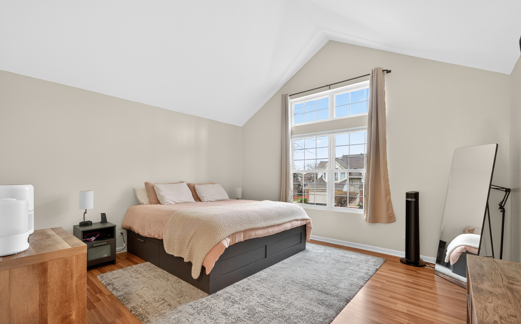 125 Ione Drive, Unit A South Elgin, IL 60177 - Photo 24 of 44 a bedroom with a large bed and a window