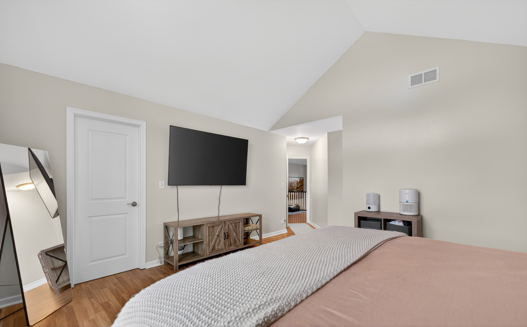 125 Ione Drive, Unit A South Elgin, IL 60177 - Photo 25 of 44 a bedroom with a bed and a flat screen tv