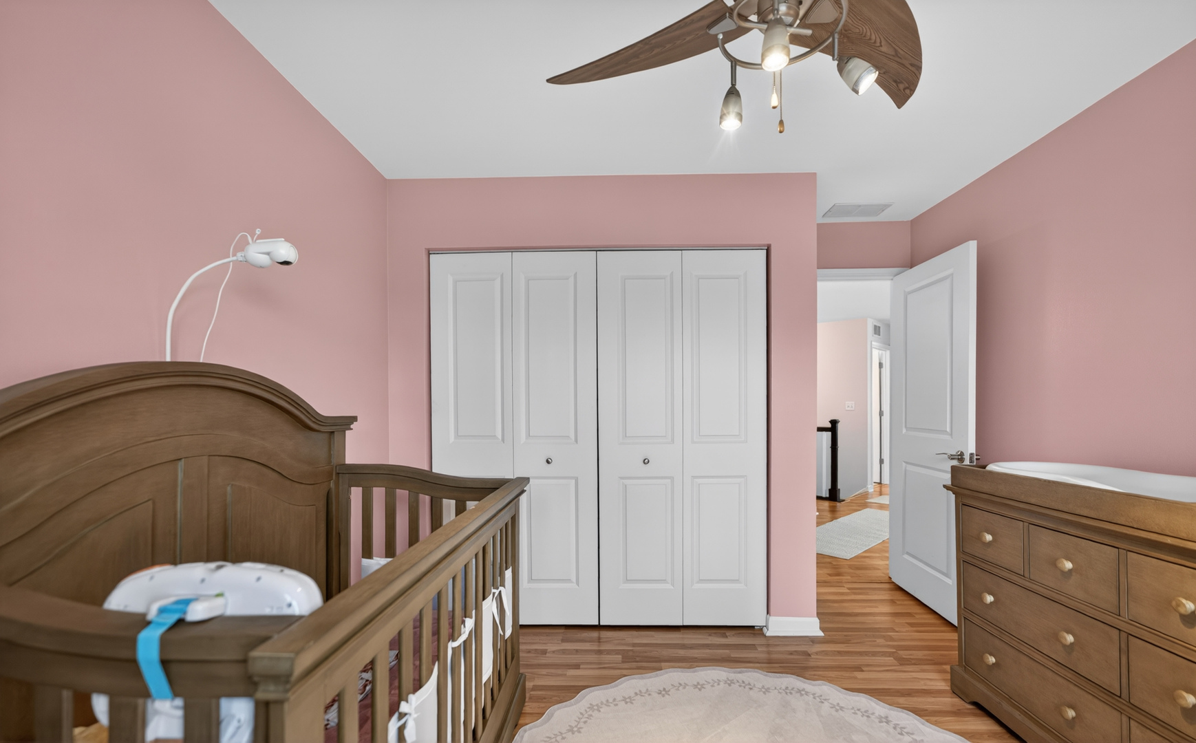 125 Ione Drive, Unit A South Elgin, IL 60177 - Photo 31 of 44 a bedroom with a bed and a dresser
