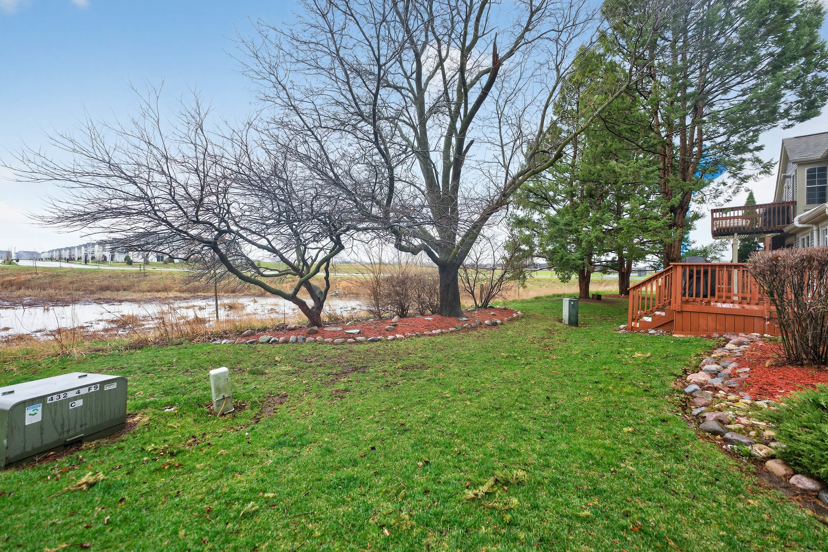 125 Ione Drive, Unit A South Elgin, IL 60177 - Photo 41 of 44 a view of backyard with huge green area and large trees