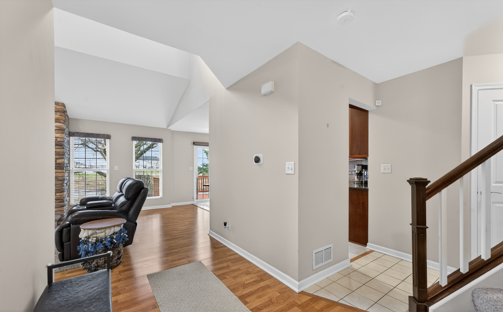 125 Ione Drive, Unit A South Elgin, IL 60177 - Photo 5 of 44 a view of a livingroom with furniture and windows