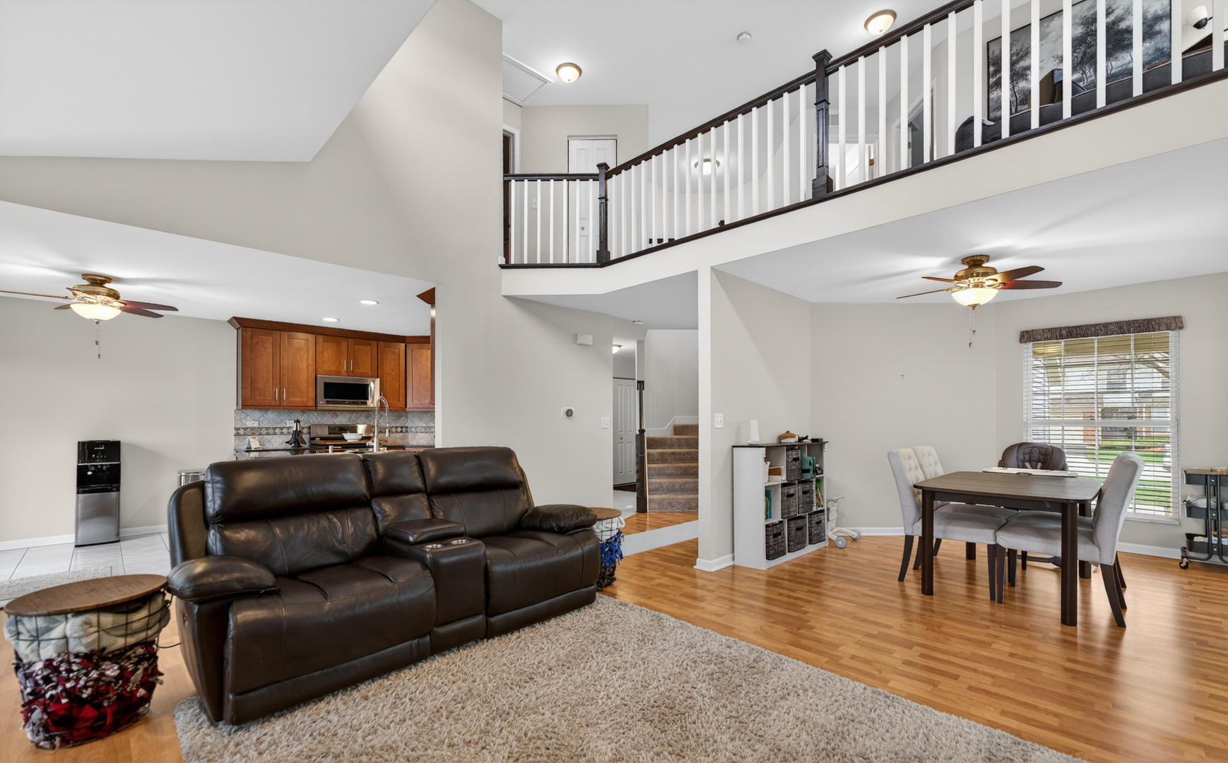 125 Ione Drive, Unit A South Elgin, IL 60177 - Photo 9 of 44 a living room with furniture and wooden floor