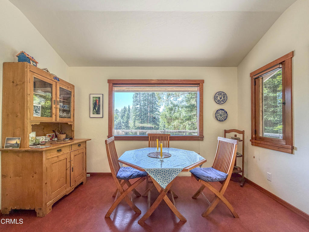 28680 Comptche Ukiah Road Comptche, CA 95427 - Photo 16 of 58 a view of a dining room with furniture and window