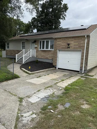 a front view of house with yard