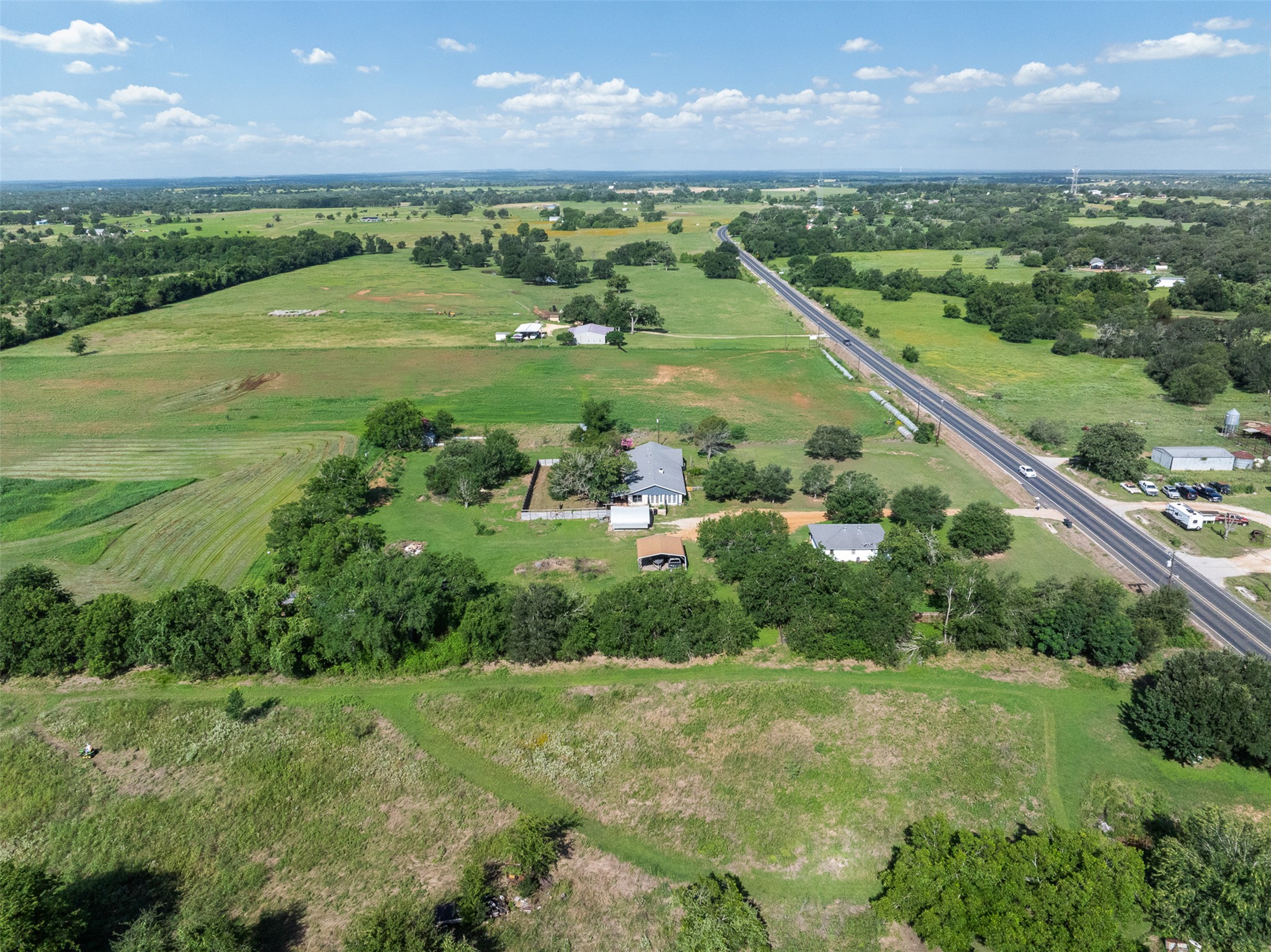 1015 FM 112 Road Lexington, TX 78947 - Photo 30 of 38 a view of a city and a yard