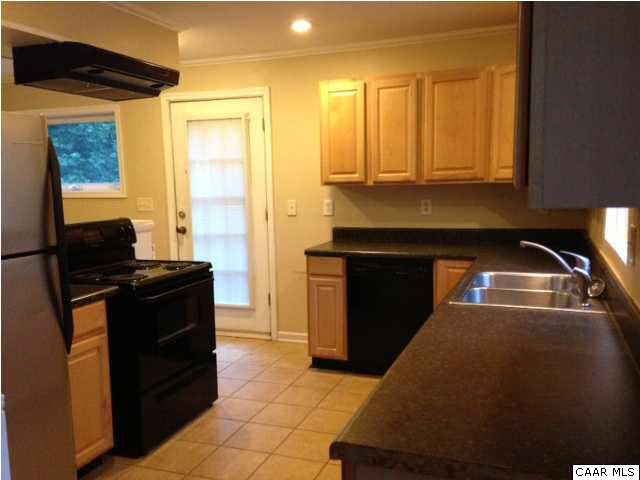 4296 Garth Road Crozet, VA 22932 - Photo 40 of 46 a kitchen with a refrigerator and a stove