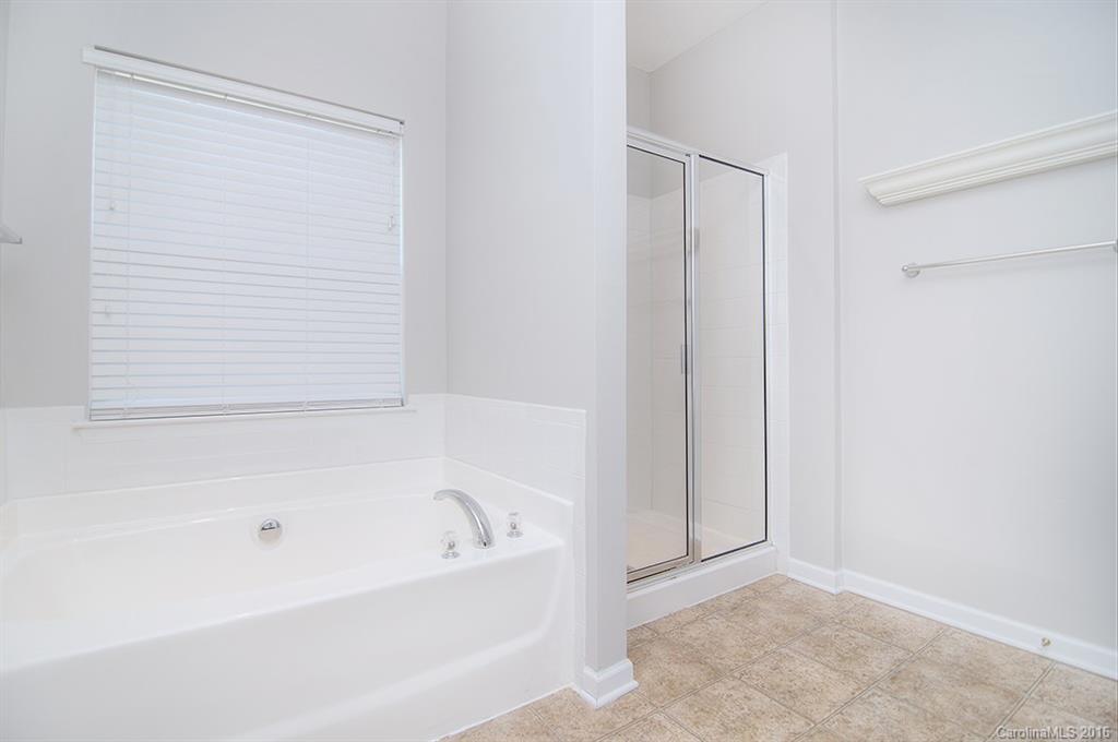 7510 Turley Ridge Lane Charlotte, NC 28273 - Photo 13 of 23 a bathroom with a bathtub