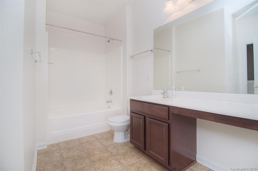 7510 Turley Ridge Lane Charlotte, NC 28273 - Photo 16 of 23 a bathroom with a sink a toilet and shower