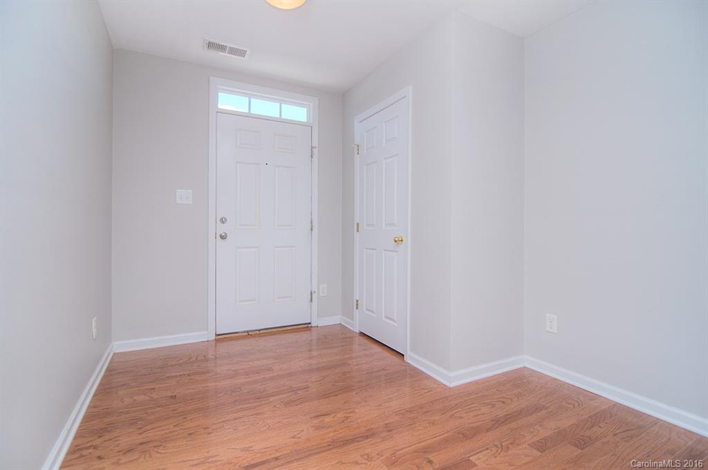 7510 Turley Ridge Lane Charlotte, NC 28273 - Photo 19 of 23 a view of an empty room with wooden floor and closet