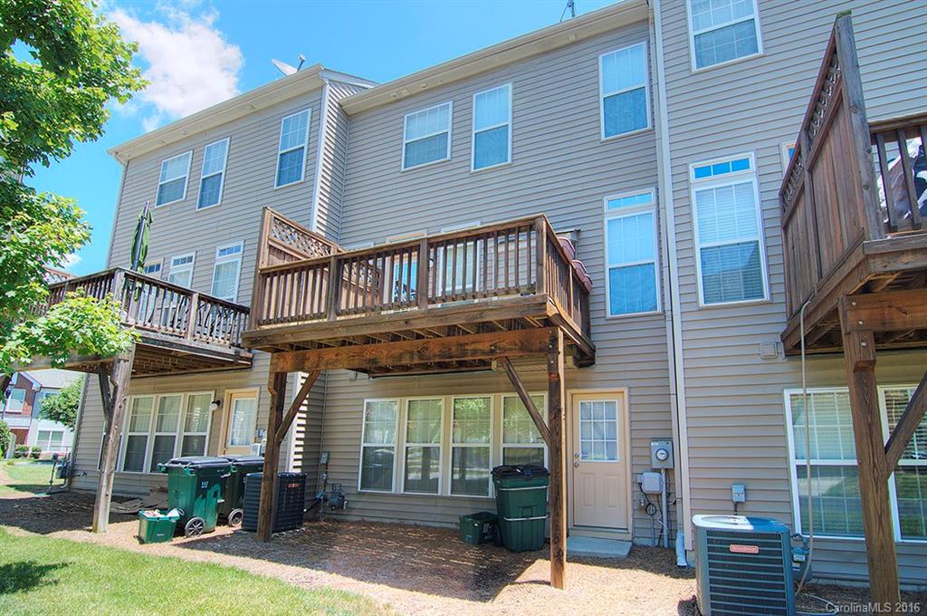 7510 Turley Ridge Lane Charlotte, NC 28273 - Photo 21 of 23 a view of a brick house with many windows
