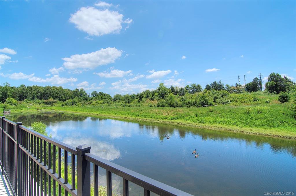 7510 Turley Ridge Lane Charlotte, NC 28273 - Photo 22 of 23 a view of a lake with a city from a lake