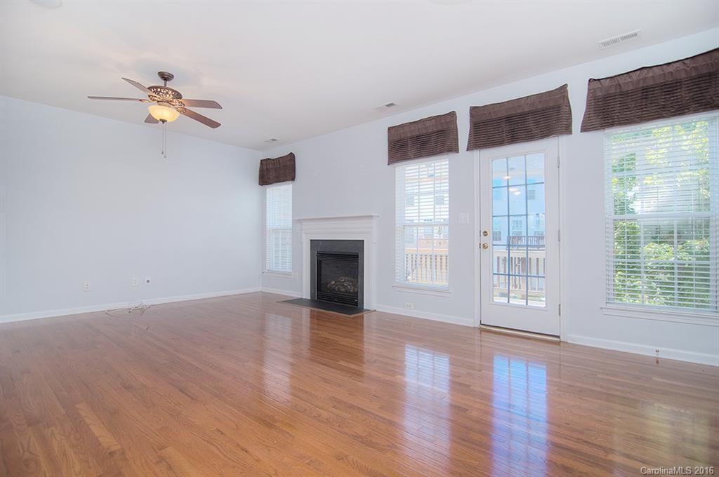 7510 Turley Ridge Lane Charlotte, NC 28273 - Photo 6 of 23 a view of empty room with wooden floor and fan