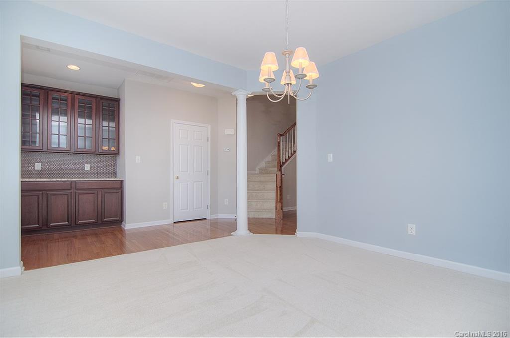 7510 Turley Ridge Lane Charlotte, NC 28273 - Photo 10 of 23 a view of a kitchen with a sink and chandelier