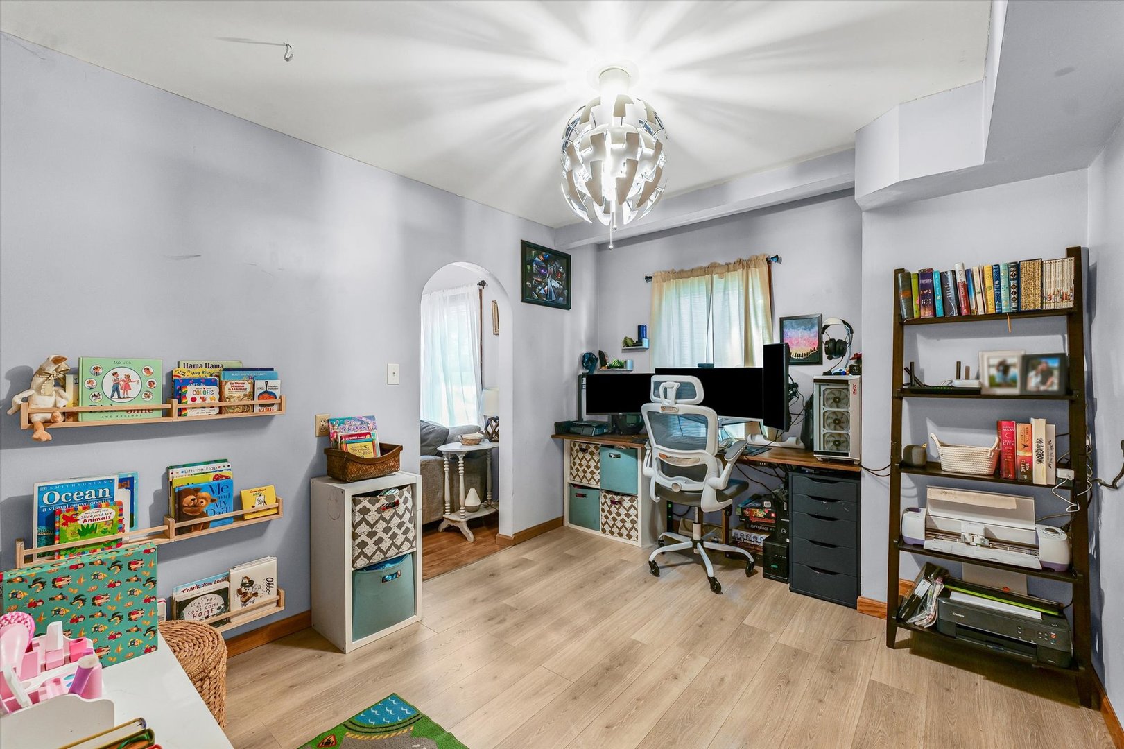 505 North Calhoun Street Tolono, IL 61880 - Photo 11 of 31 a view of a workspace with furniture and a kitchen