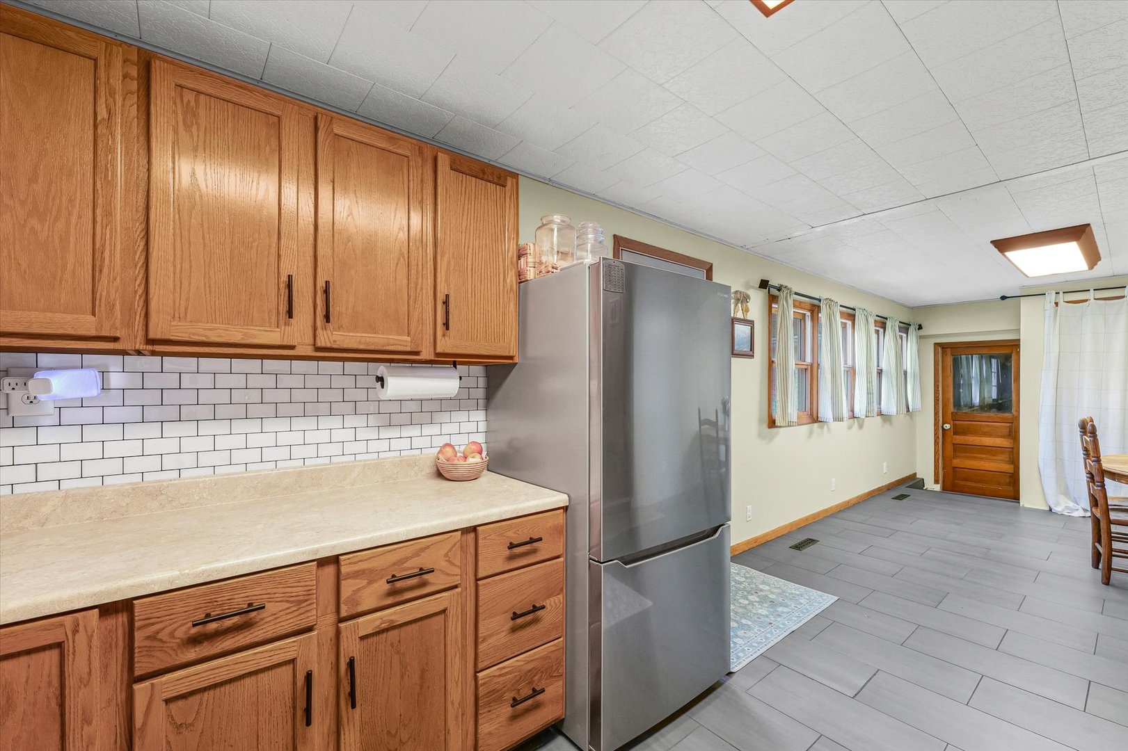 505 North Calhoun Street Tolono, IL 61880 - Photo 18 of 31 a kitchen with stainless steel appliances granite countertop a refrigerator and a sink