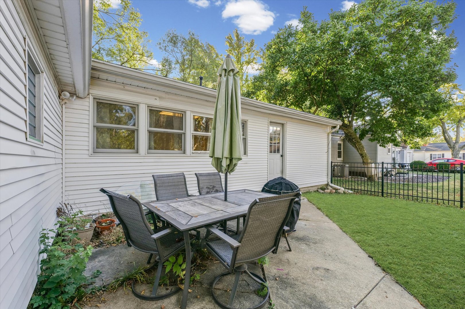 505 North Calhoun Street Tolono, IL 61880 - Photo 28 of 31 a view of a house with backyard and sitting area