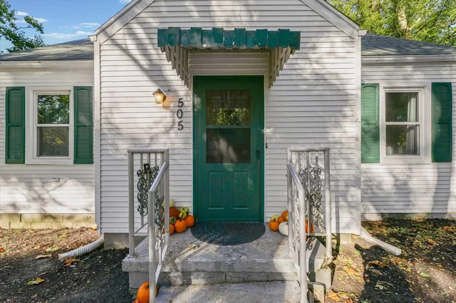 a front view of a house with an outdoor space