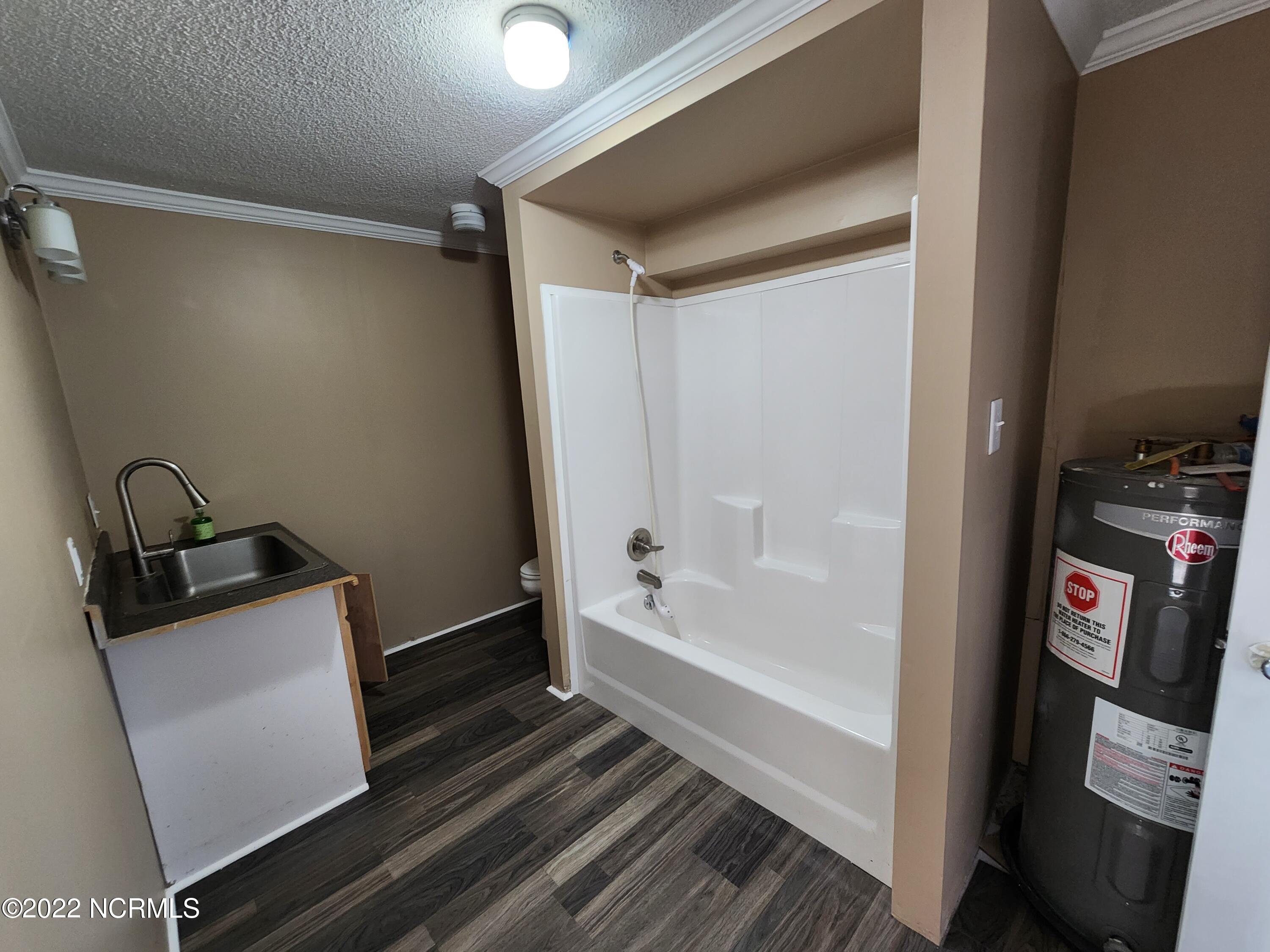 4490 Highway 41 Wallace, NC 28466 - Photo 22 of 35 Downstairs Bath