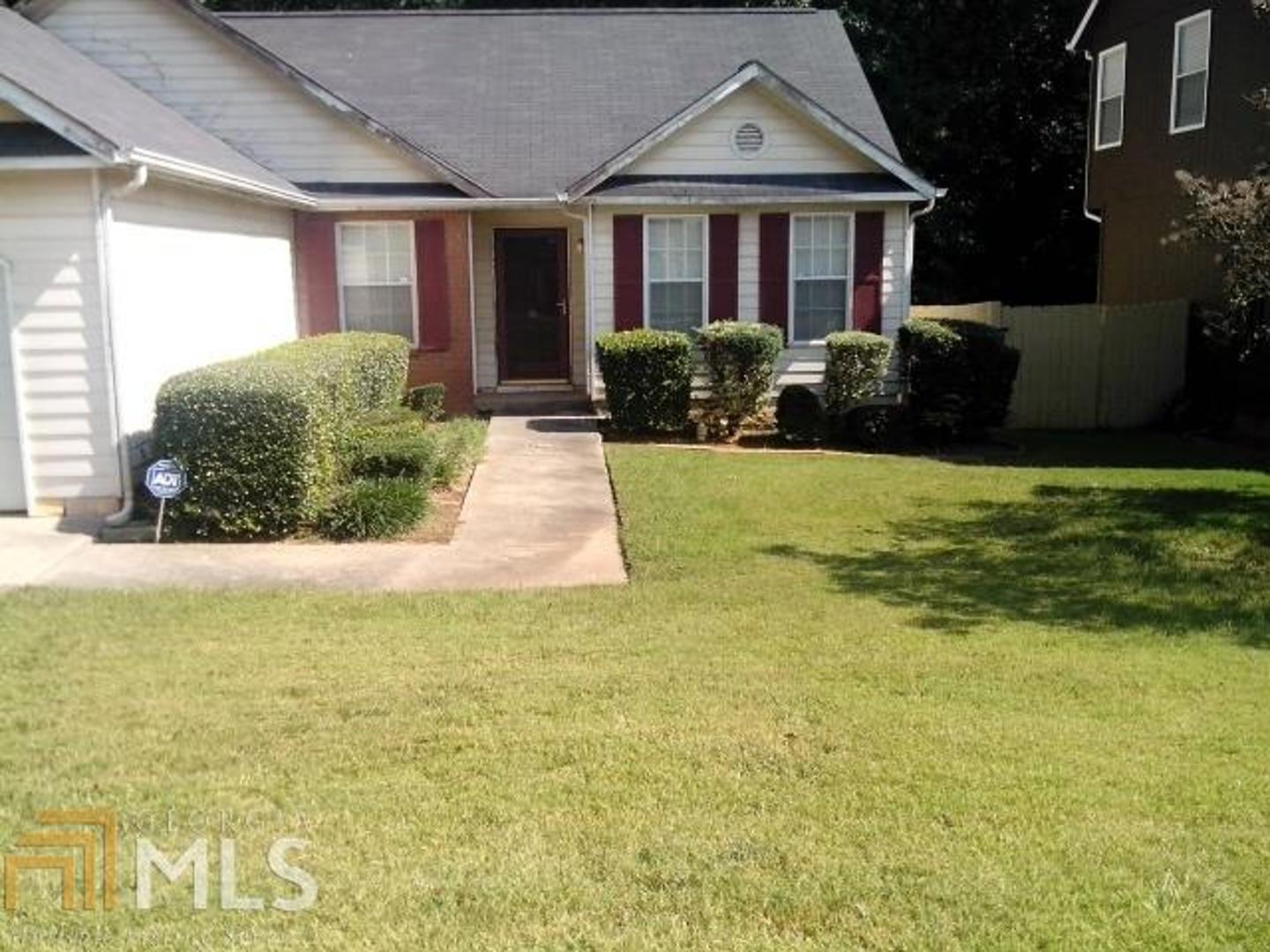2436 Kentwell Lane Decatur, GA 30035 - Photo 1 of 1 a view of a house with a yard and potted plants
