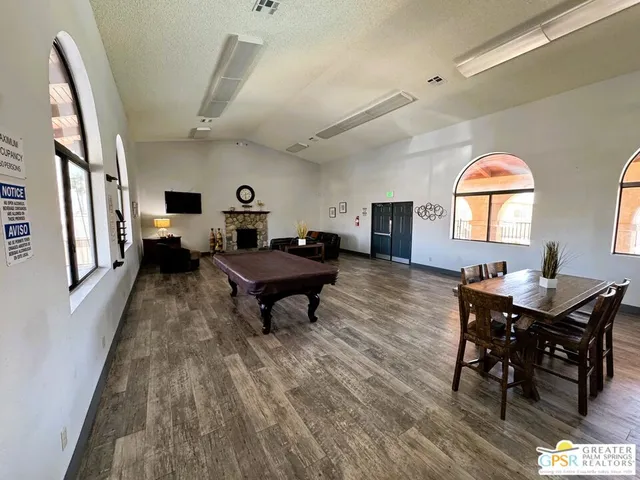 a kitchen with a refrigerator a sink and a stove