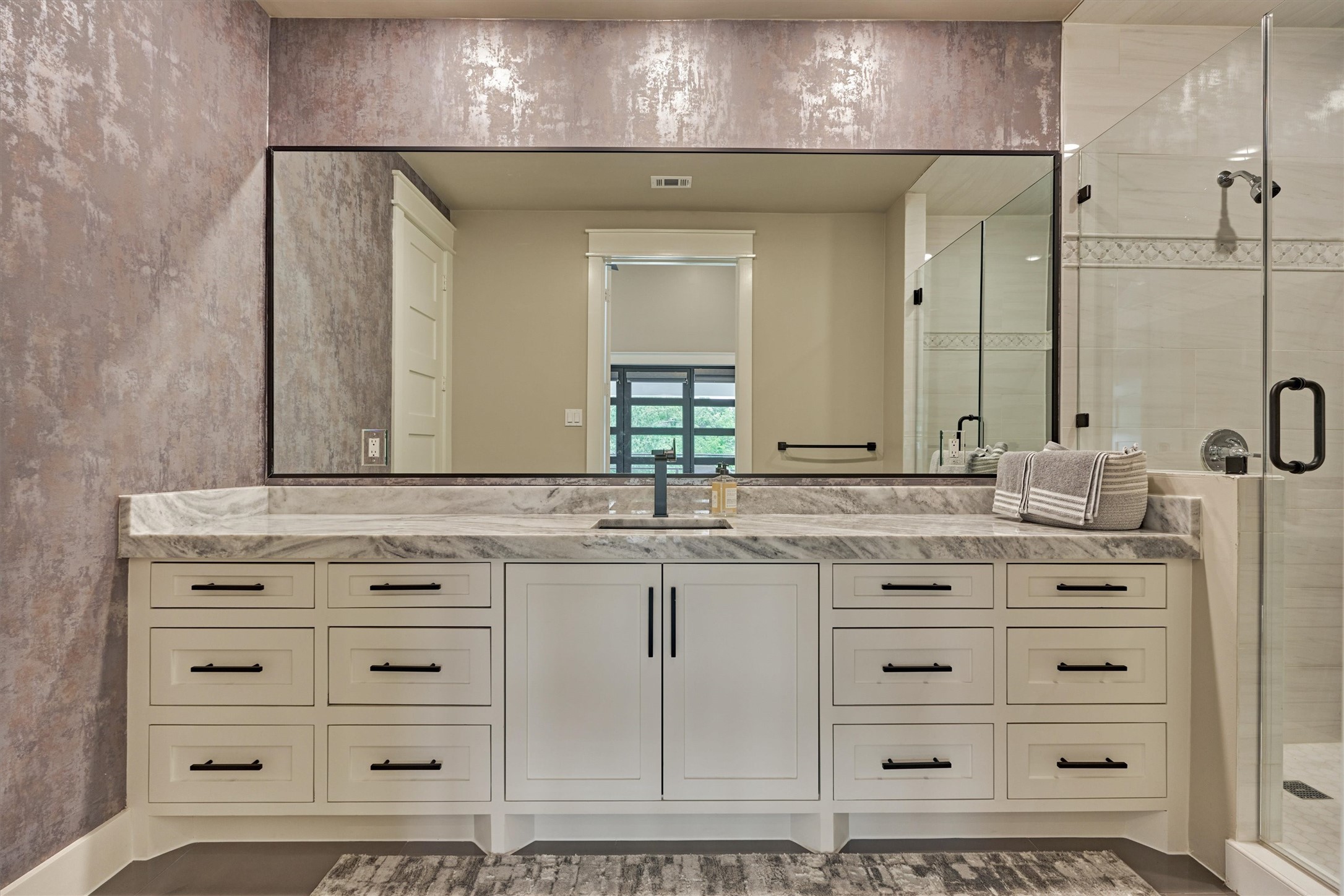1907 Woerner Road Houston, TX 77090 - Photo 40 of 50 Second floor primary bath with walk in shower and XL vanity.