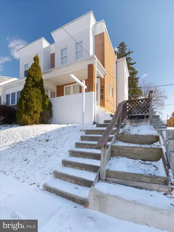 a view of a house with a park