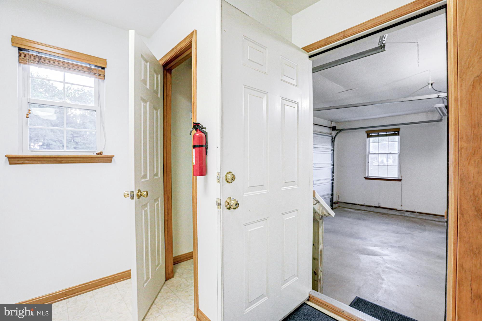 230 Tina Marie Lane Smyrna, DE 19977 - Photo 66 of 83 a view of a hallway with wooden floor and closet