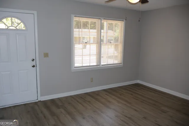 an empty room with windows