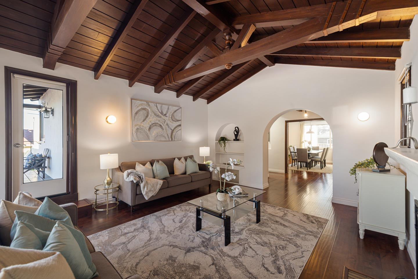 943 Hillcrest Boulevard Millbrae, CA 94030 - Photo 12 of 51 a living room with furniture and wooden floor